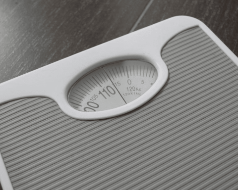 What advice is given to women in their mid-life to prevent obesity?