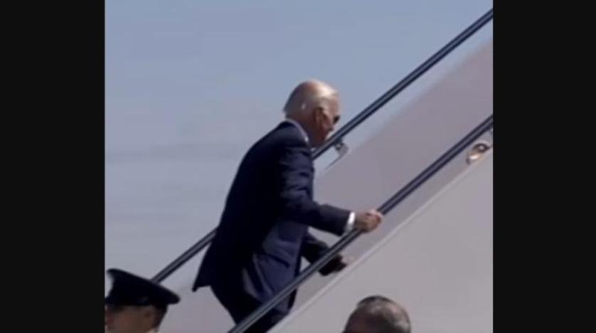 Biden stumbles again as he boards presidential plane